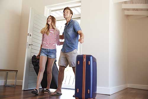 Couple with suitcases